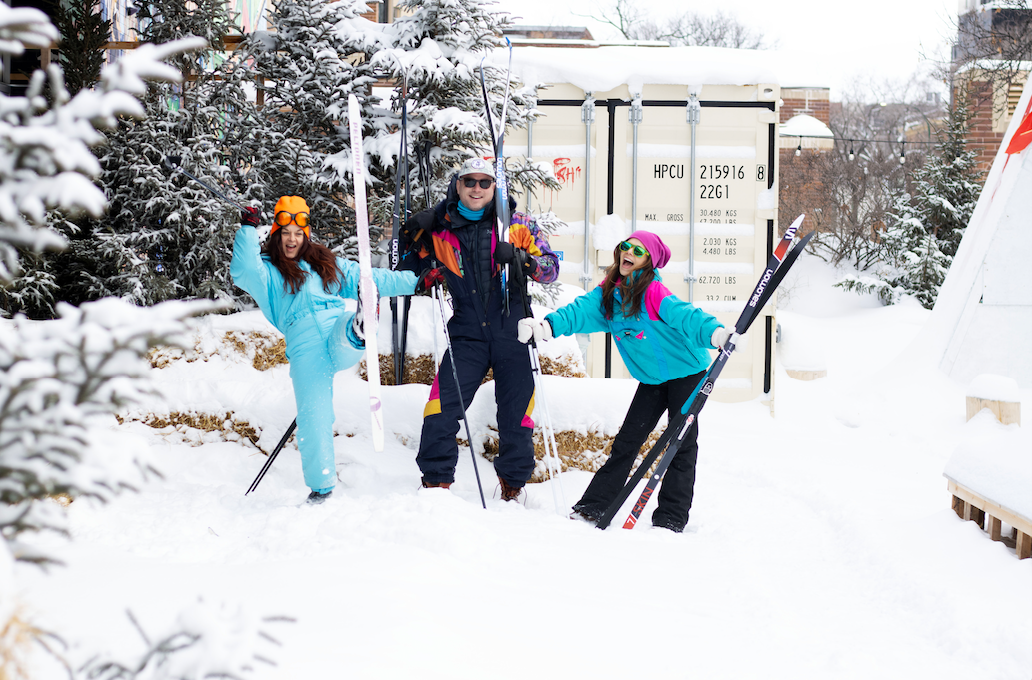 three people in retro snow gear