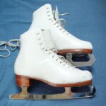 figure skates on a blue background